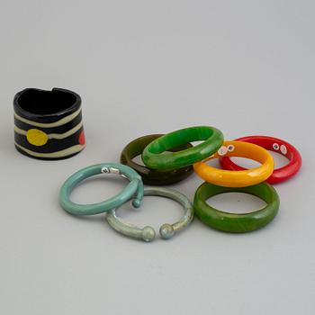 a set of eight plastic and bakelit bracelets, 20th century.