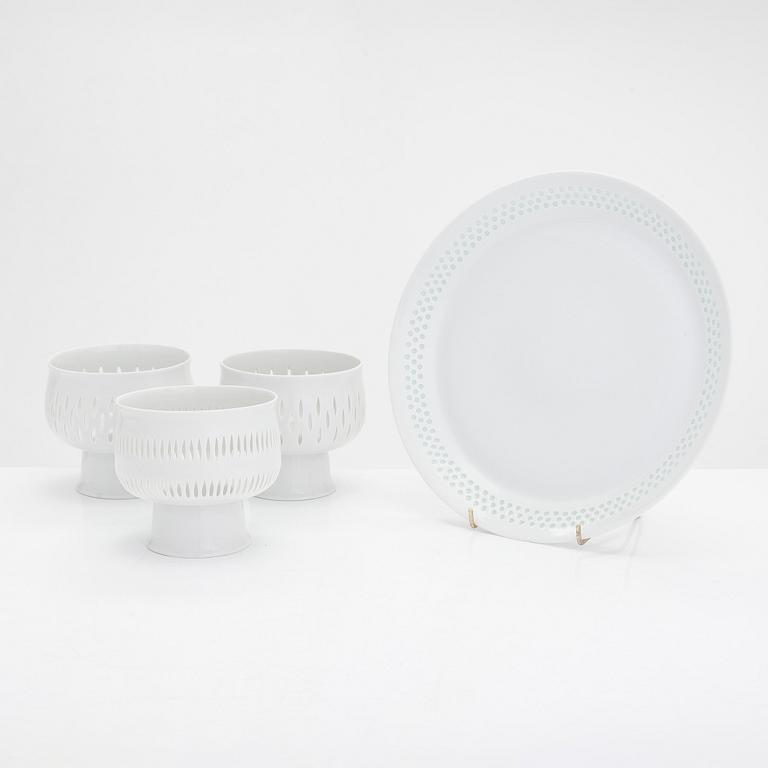 Friedl Holzer-Kjellberg, three porcelain candle holders and a "Helmi" plate, Arabia, 1970s.