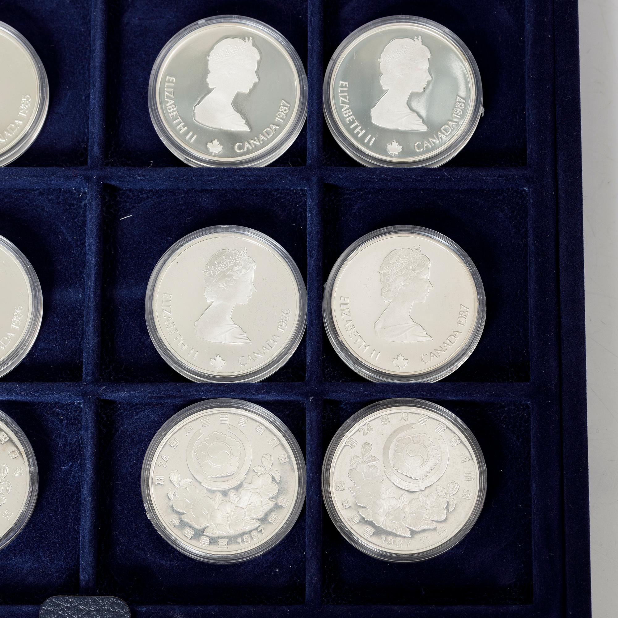 Twelve commemorative sterling silver coins, Olympic Games, Calgary and Seoul, 1988.