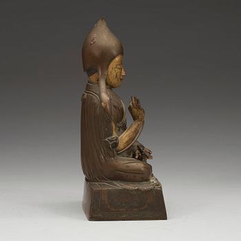 A seated bronze figure of a Lama, Sino-Tibetan, 18th/19th  Century.