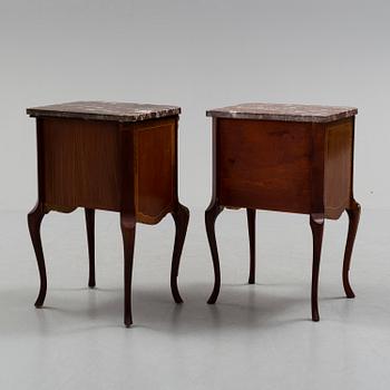 A pair of mid 20 th century mahogany bedside tables.