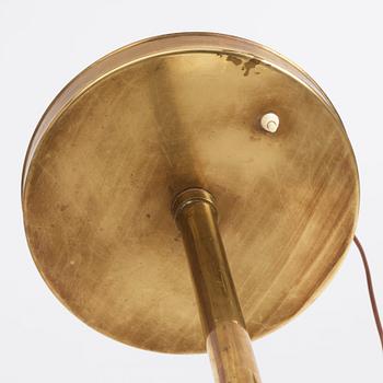 Carl-Axel Acking, a brass and leather floor lamp, designed for the Stockholm Association of Crafts in 1939.