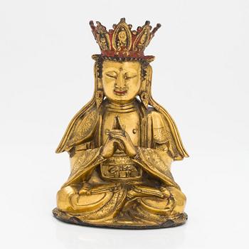 1091. A gilt-bronze figure of Vairochana, Ming dynasty (1638-1644).