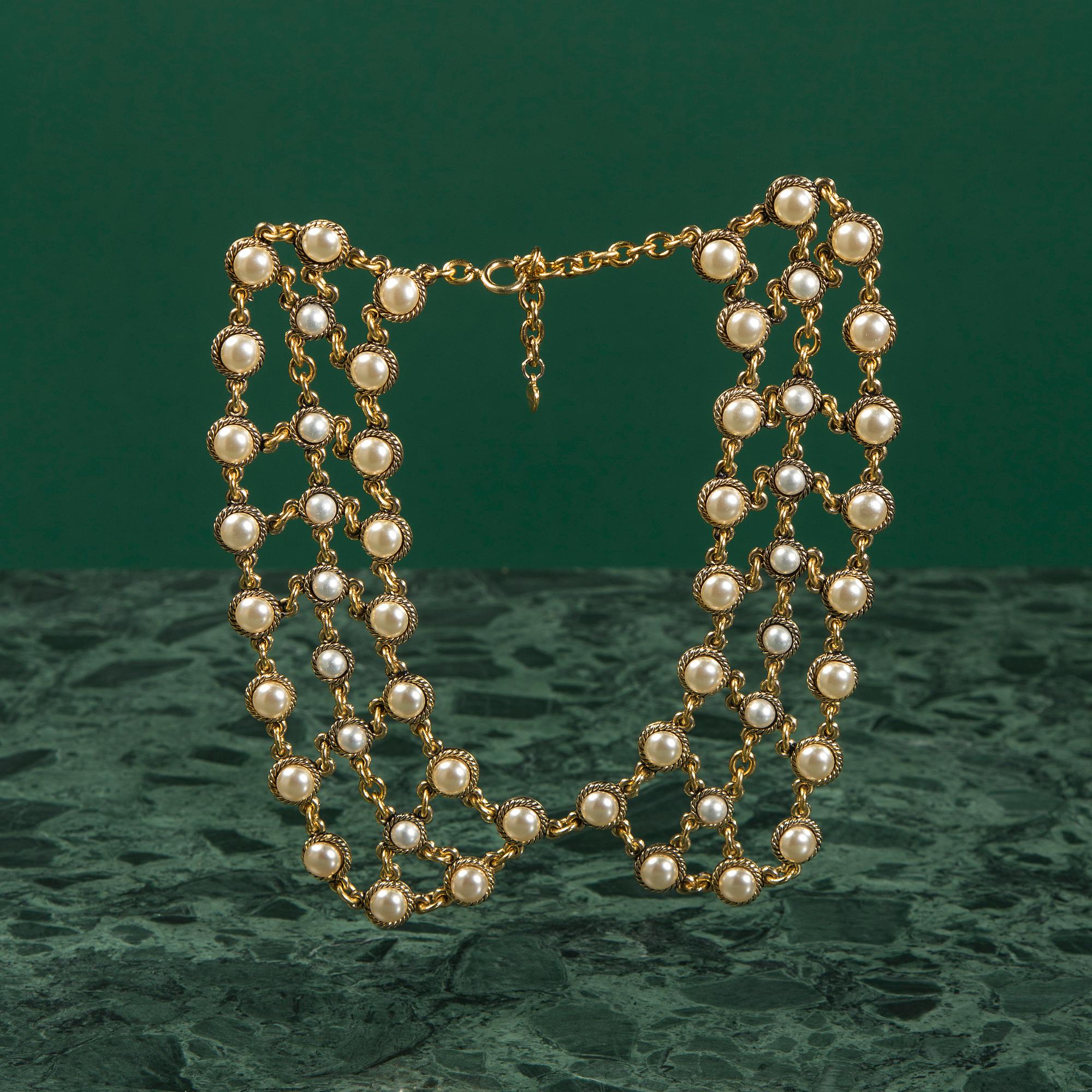 A necklace by MOSCHINO.