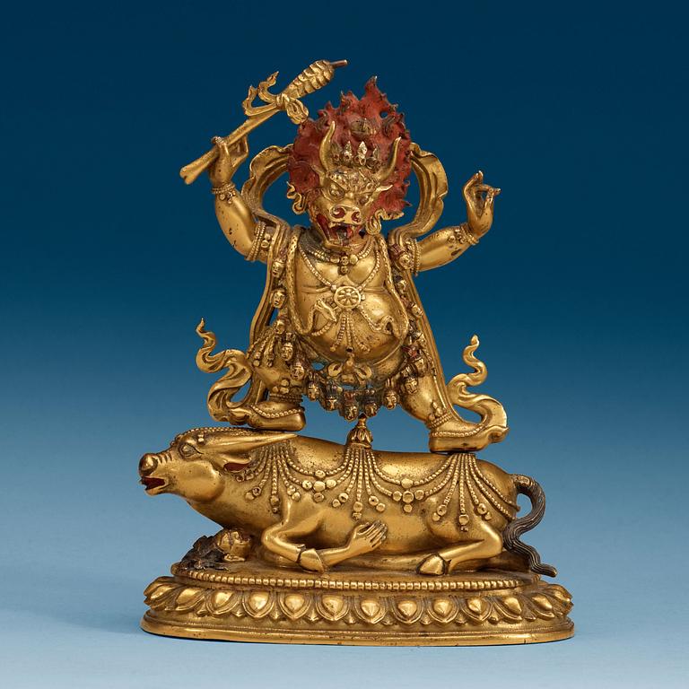 A Sinotibetan gilt bronze and lacquered figure of Yama, Qing dynasty, presumably 18th Century.