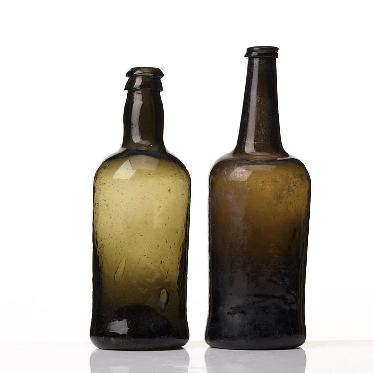 Two green glass bottles, 18th/19th Century.