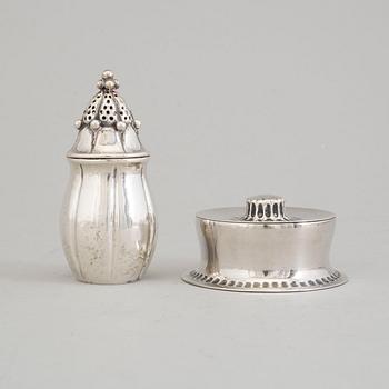 A Swedish Art Nouveau parcel-gilt lidded box and silver pepper shaker, mark's Anders Nilsson, Lund 1913 and 1922.