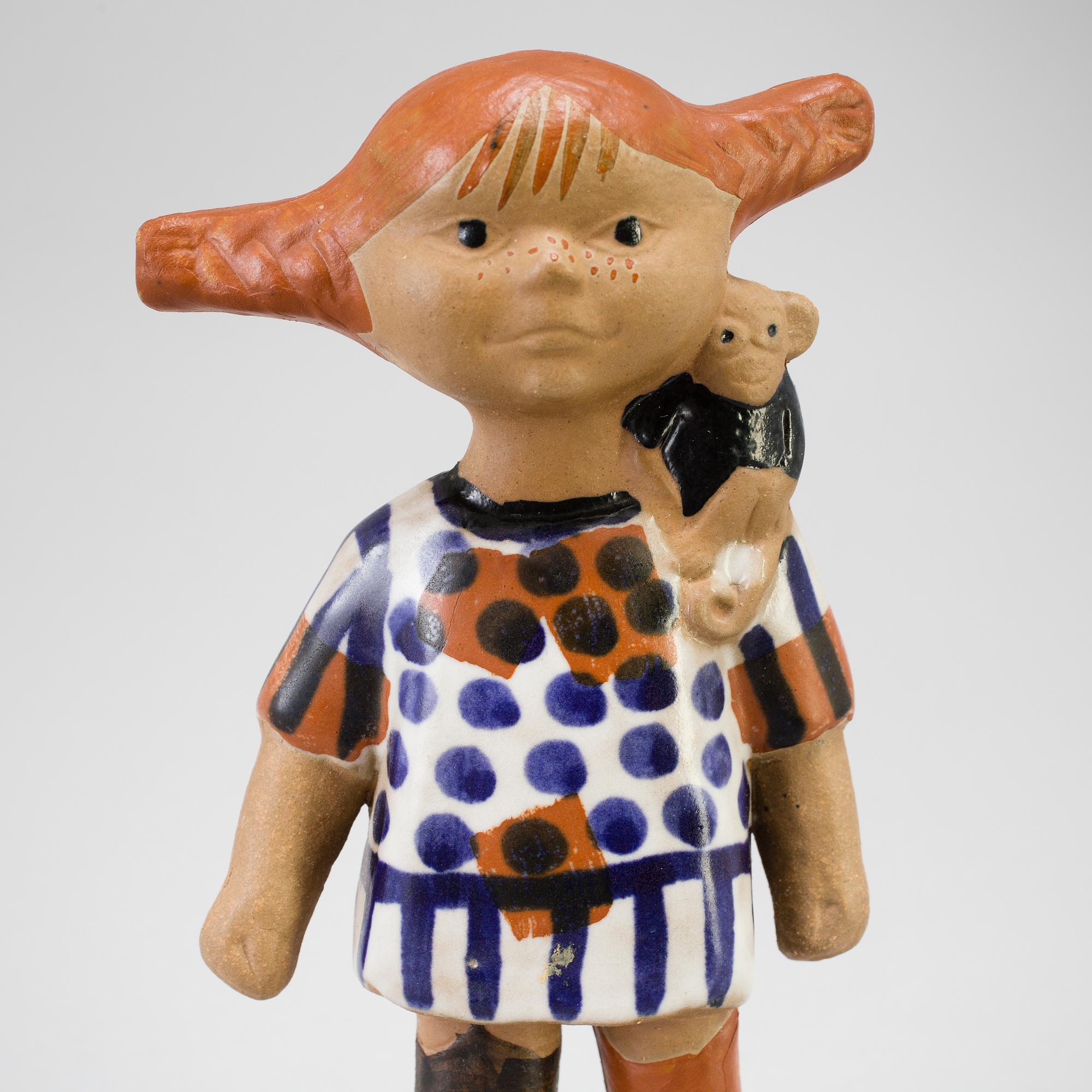 A stoneware figurine by Lisa Larson for Gustavsberg, Pippi Långstrump, produced 1969-1971.
