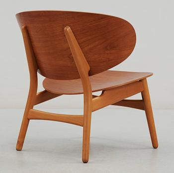 A Hans J Wegner teak and beechwood 'shell chair', Fritz Hansen, Denmark 1950's.