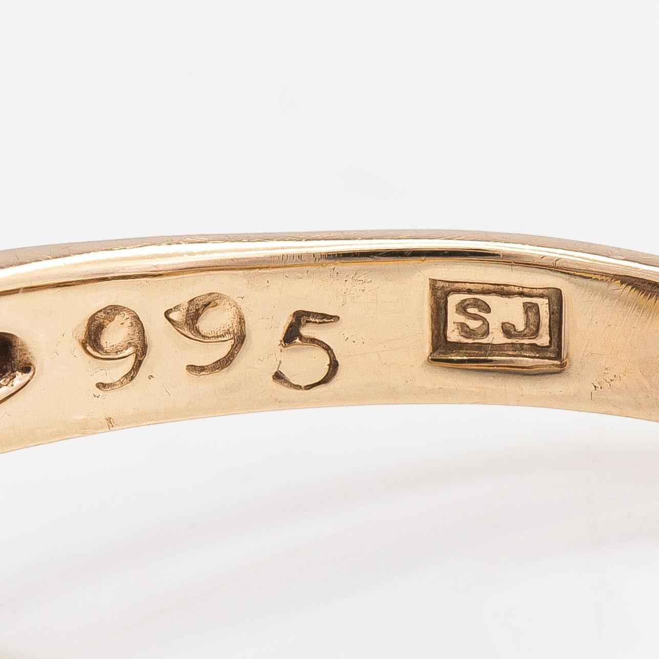 Ring, i form av hjärta, 14K guld, diamanter ca 0.15 ct totalt och rubiner, London 1996.