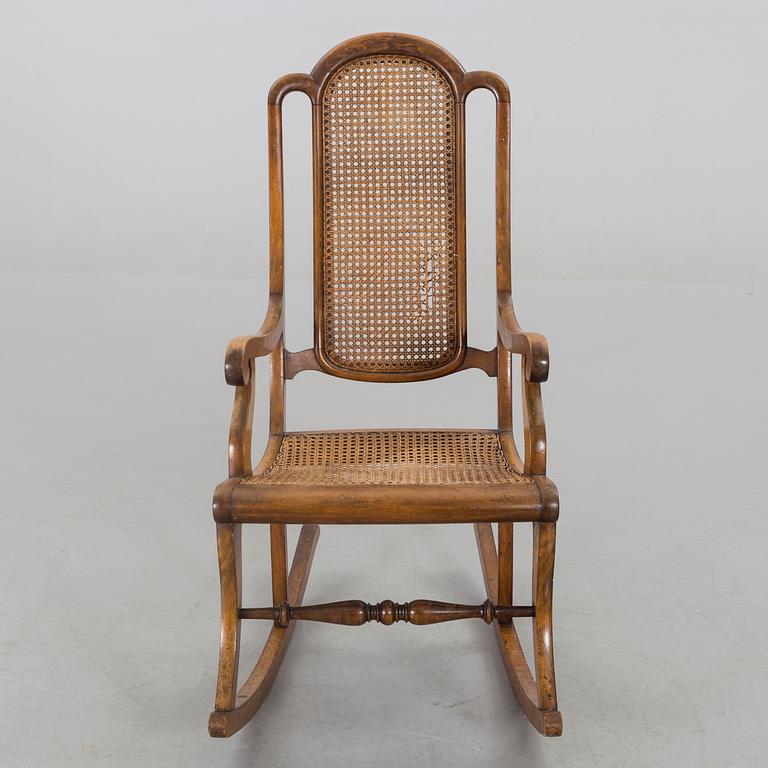 A ROCKING CHAIR LATER PART OF THE 19TH CENTURY.