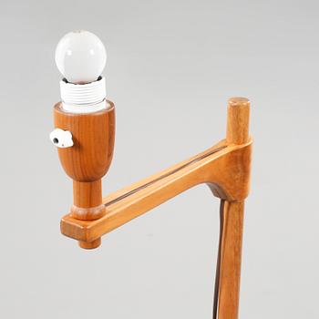 A floor lamp by carl Malmsten called "staken" from the second half of the 20th century.