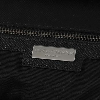 Dolce & Gabbana, a black leather weekend bag.