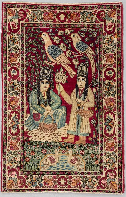 A rug, Antique Kerman Laver, ca 81 x 51 cm.