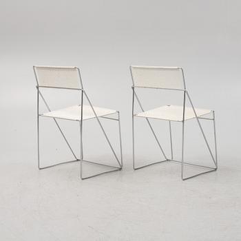 Nils Jörgen Haugesen, a pair of 'X-Line' chairs, Hybodan, Denmark, the model designed in 1977.