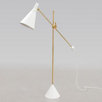 AN ADJUSTABLE FLOOR LAMP, K10-11. Manufactured by Idman Oy. Designed 1958.