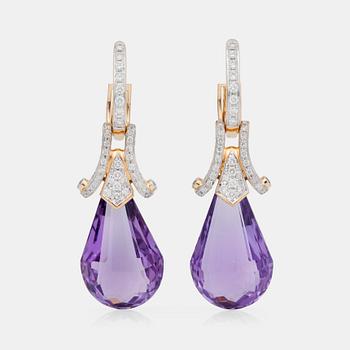 A pair of amethyst, circa 36 cts, and diamond earring.