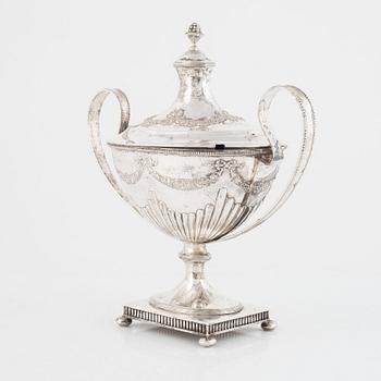 A Gustavian style Swedish silver sugarbowl with cover, mark of CG Hallberg, Stockholm, possibly 1900.