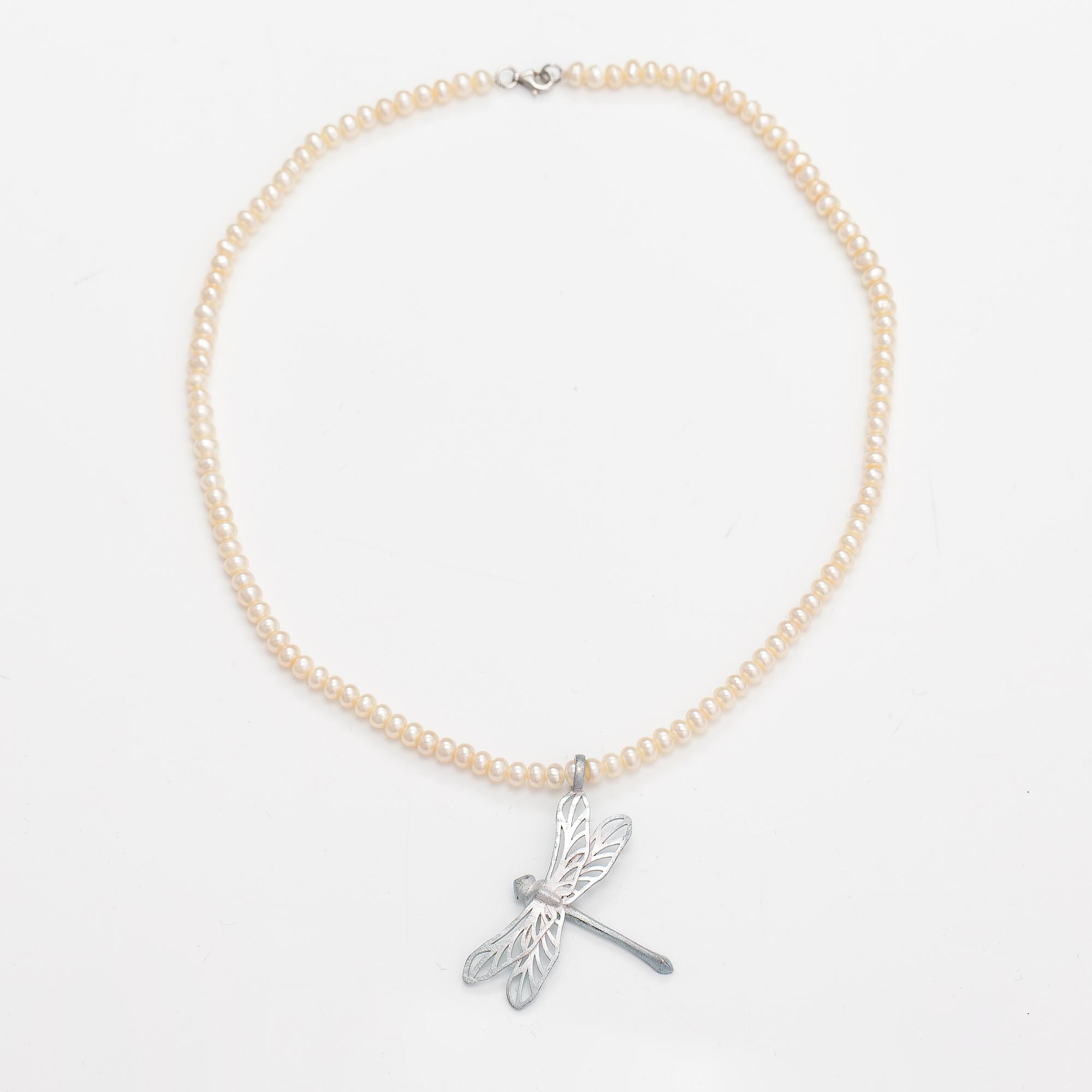A sterling silver and sweet water pearls necklace. Anssi Arnimaa.