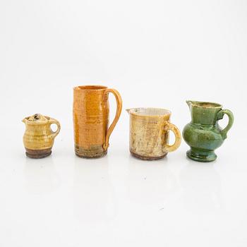 Signe Persson-Melin, a set of four 1940/50s glazed stoneware decanters.