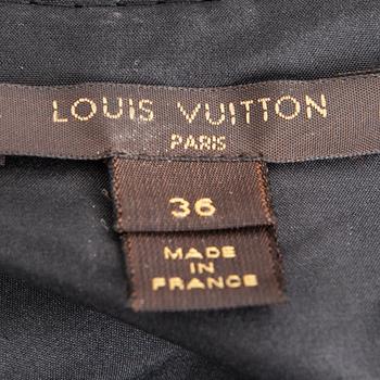 KLÄNNING, Louis Vuitton.