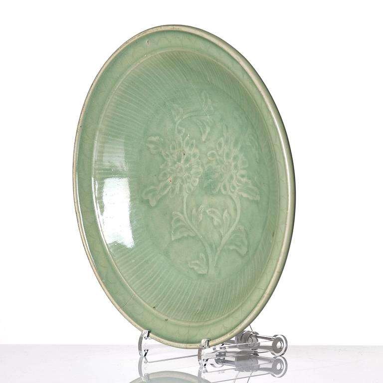 A large celadon glazed dish, Ming dynasty (1368-1644) or later.