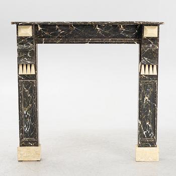 A fireplace surround, first half of the 20th Century.
