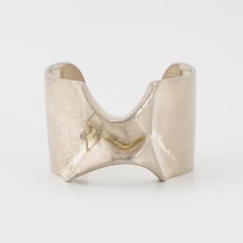 A sterling bracelet called "The Man from Mercurius", Lapponia, Finland 1970. Designed by Björn Weckström. Weight 70 gram.