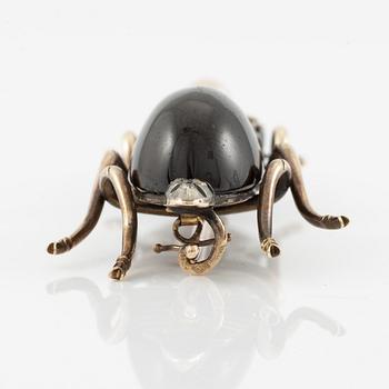 Brooch, in the form of an insect, 14K gold with garnet, diamonds, ruby, sapphire, and pearl.