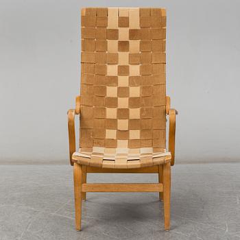 A armchair, model "Eva hög", designed by Bruno Mathsson for Firma Karl Mathsson, dated 1941.