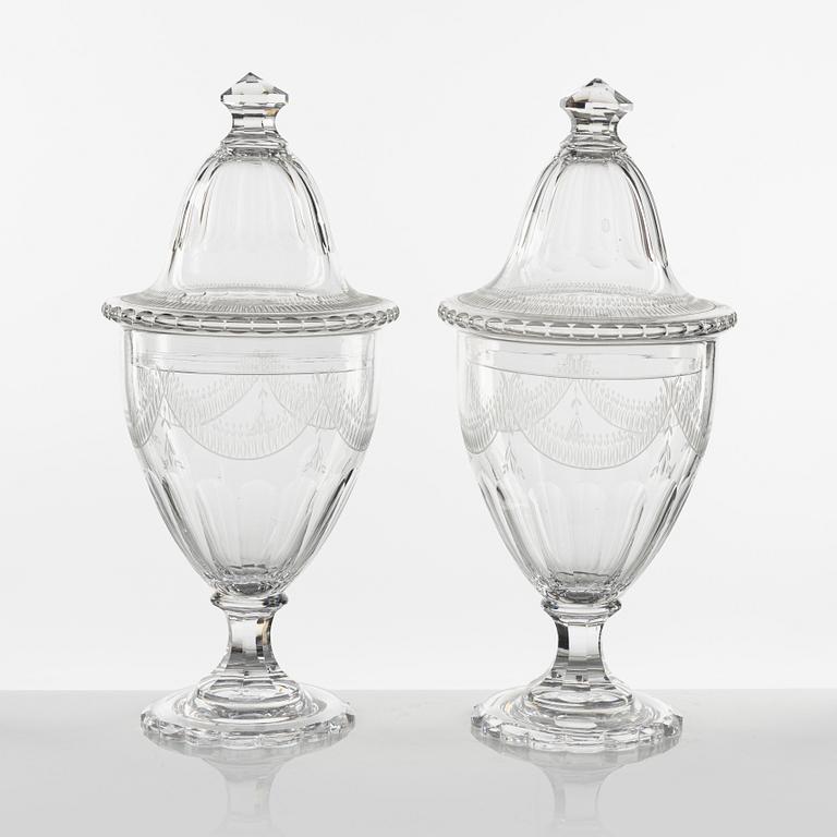 A pair of Gustavian style lidded glass vases, circa 1900.