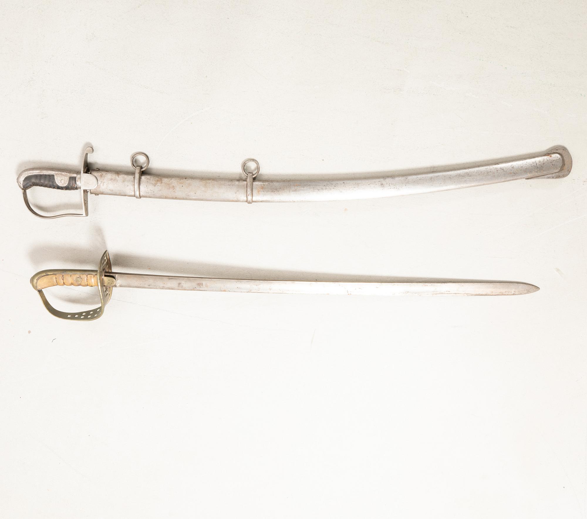 Swords 2 pcs, Swedish, m/1867 for the cavalry, and m/1831 for artillery personnel, with scabbard.