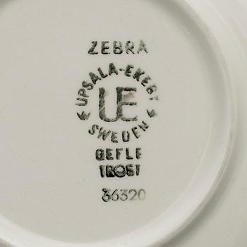 EUGEN TROST, 8 kaffekoppar med 9 fat, flintgods, "Zebra", Gefle. I produktion 1955-1967.