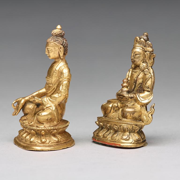 Two gilt copper alloy figures of deities, Tibeto-Chinese, 19th Century.