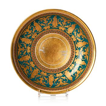 A gilded and painted Empire dish, 19th Century.