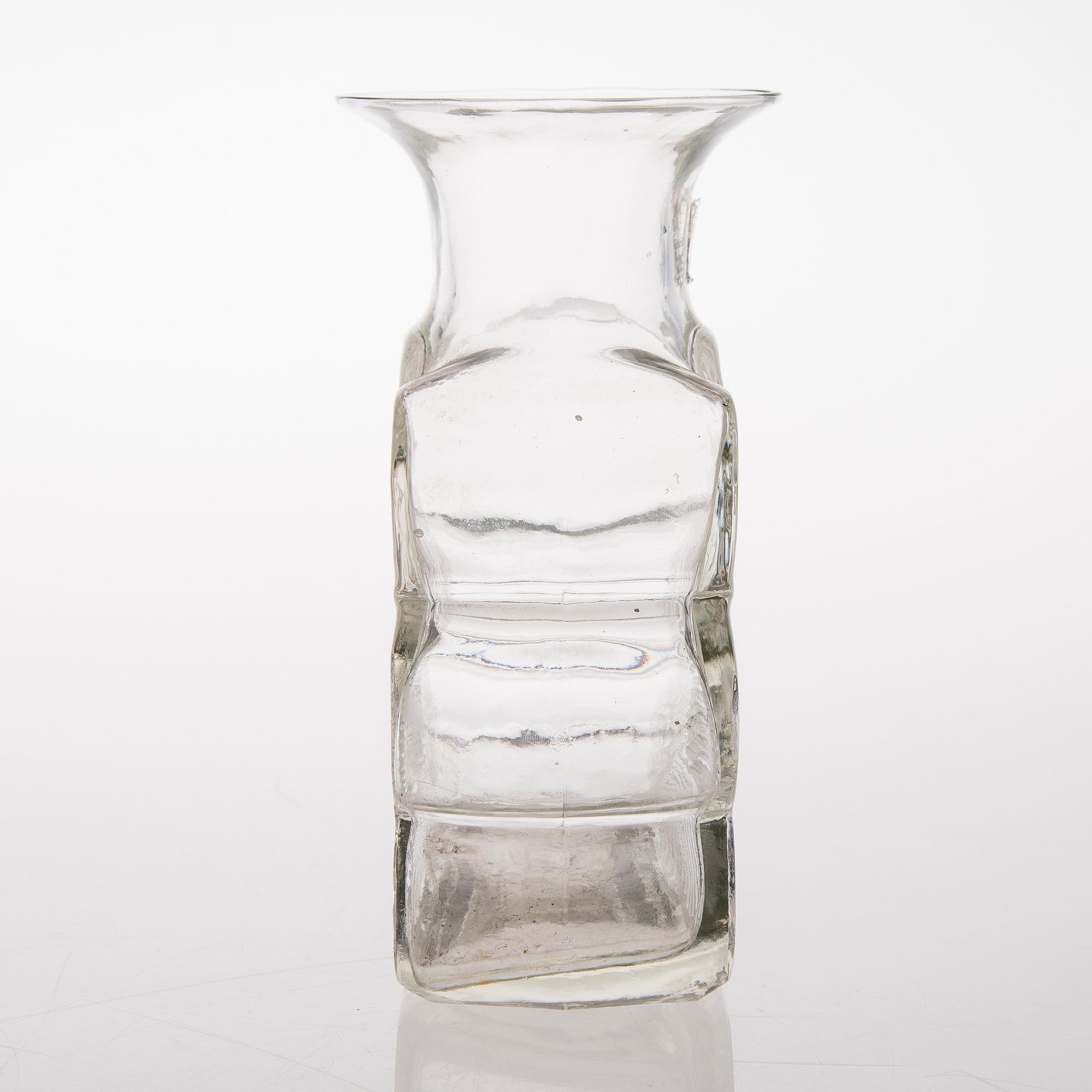 A vas and four candle holders/ vases in glass from Riihimäen Lasi, Finland 1970s.