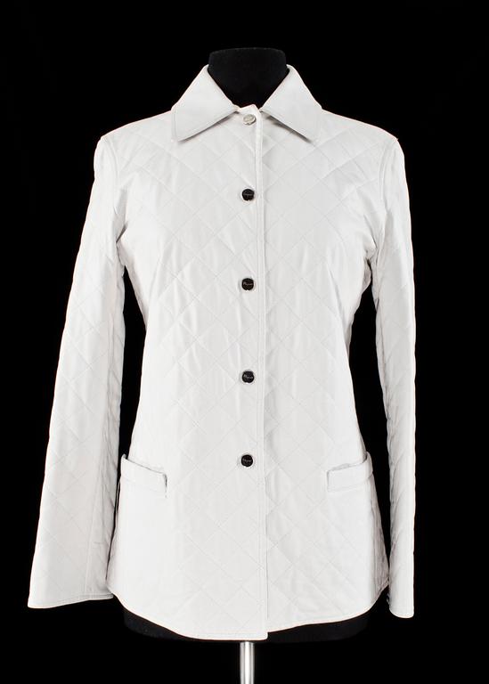 A white quilt leather jacket by Ferragamo.