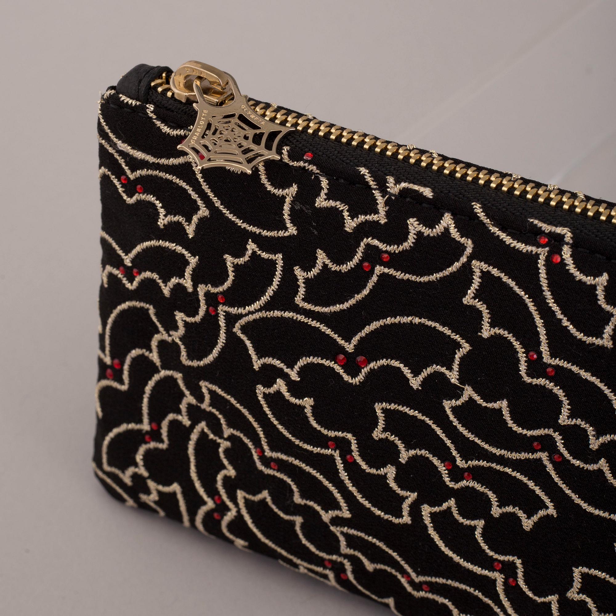 CLUTCH, Charlotte Olympia.
