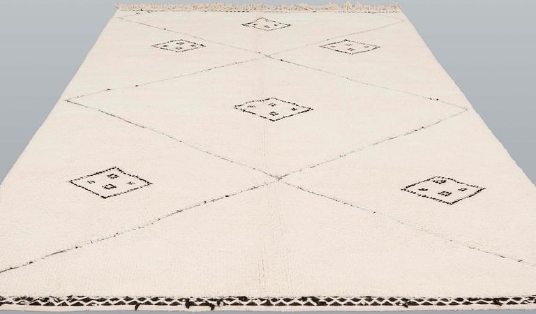 A moroccan carpet, ca 300 x 200 cm.