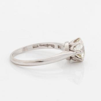 A platinum ring set with an old-cut diamond, by Wiwen Nilsson.