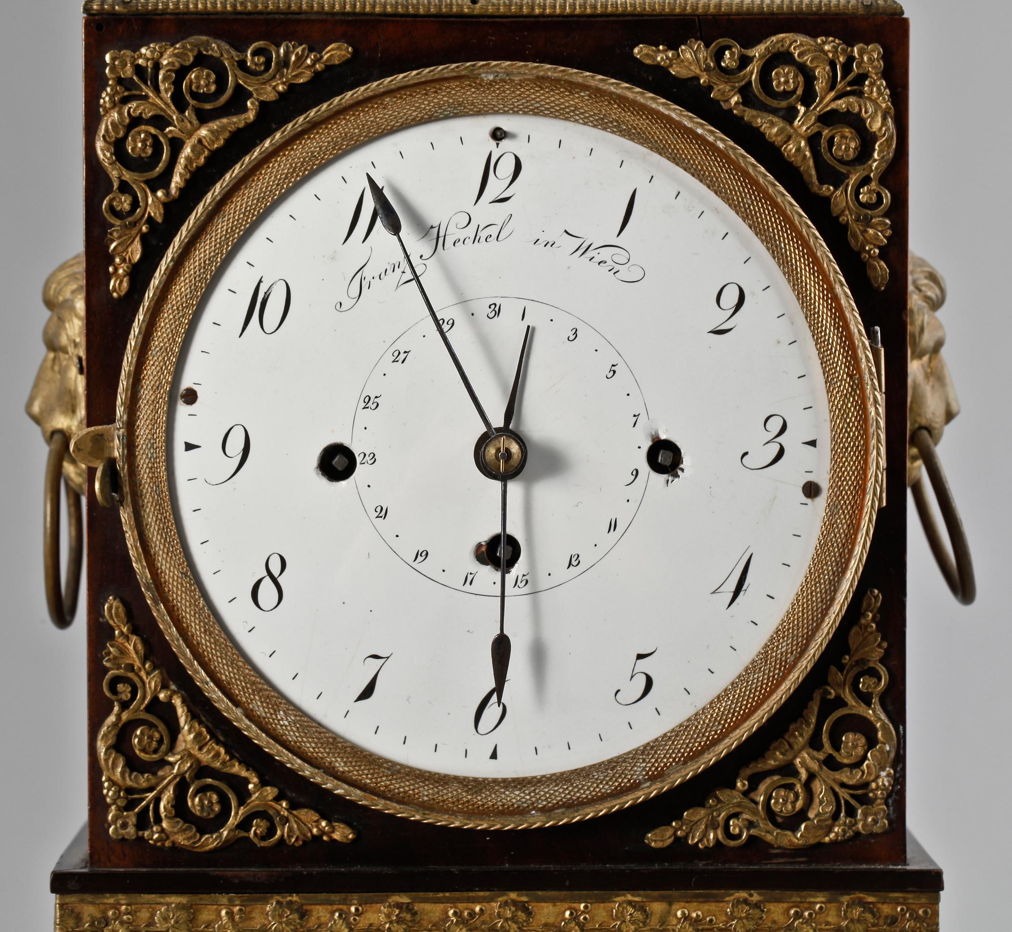 An Austrian Empire mantel clock.