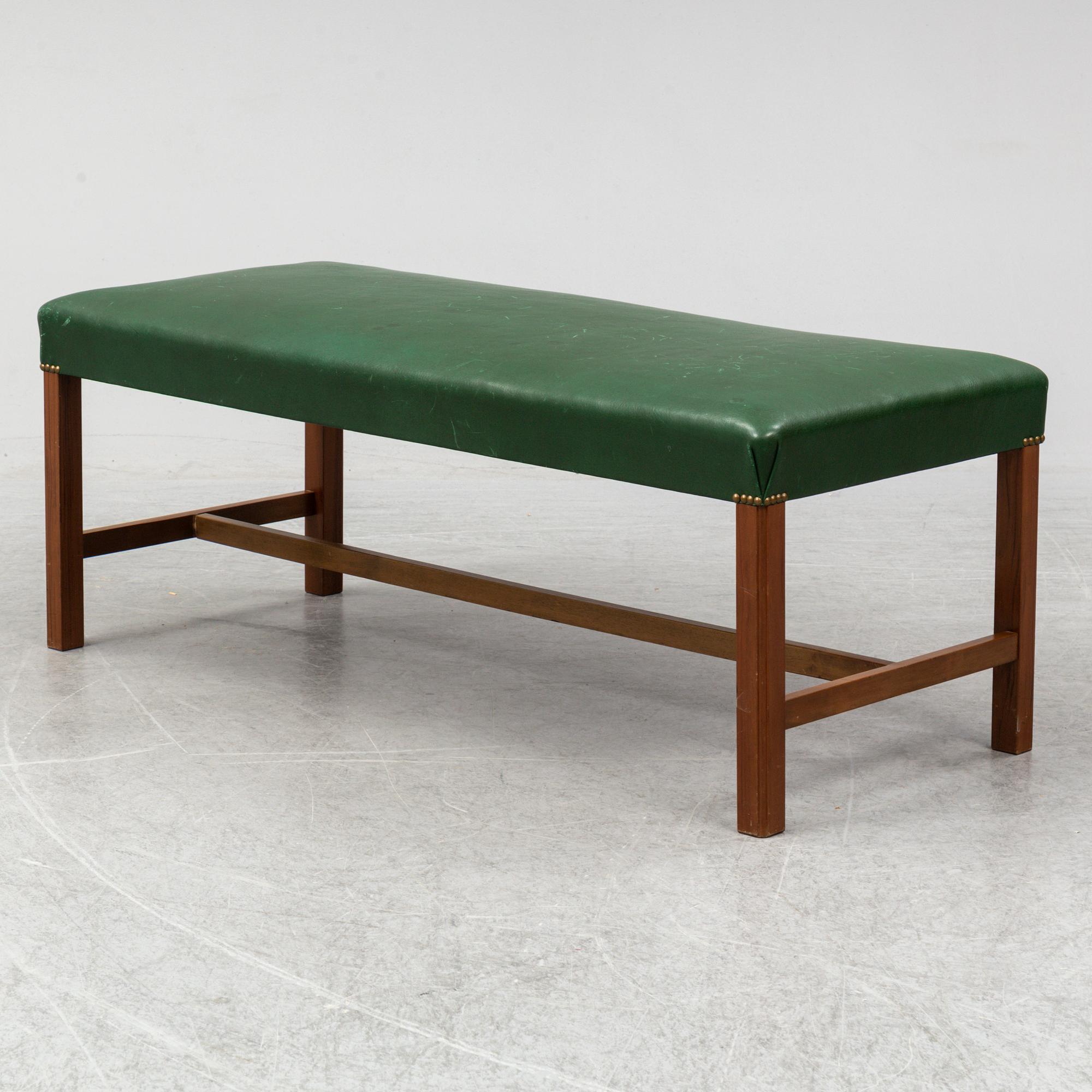 A bench "2082" by Josef Frank for Firma Svenskt Tenn.