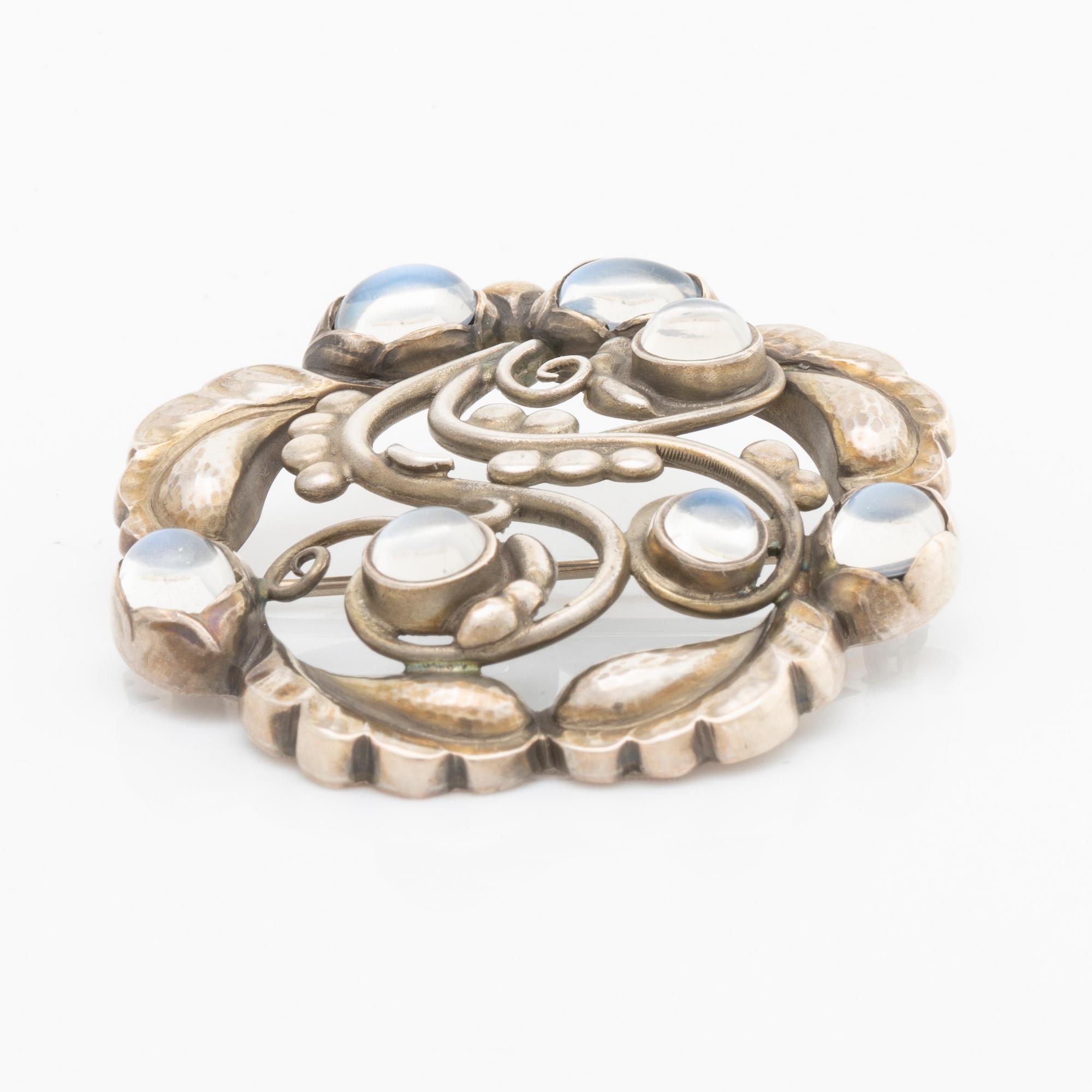 GEORG JENSEN, brosch modell 159, "Moonlight blossom".