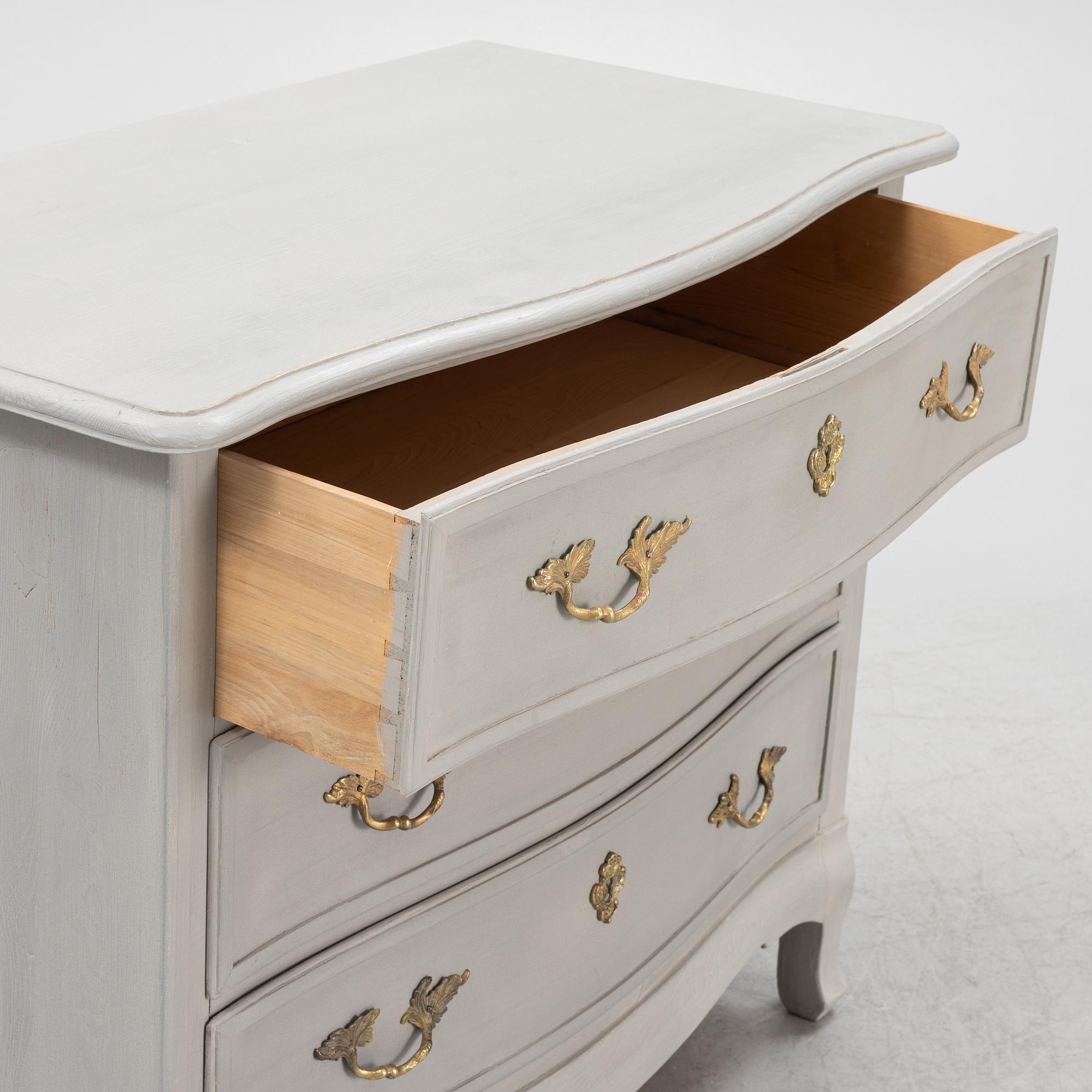 A painted Baroque style chest of drawers, mid 20th Century.