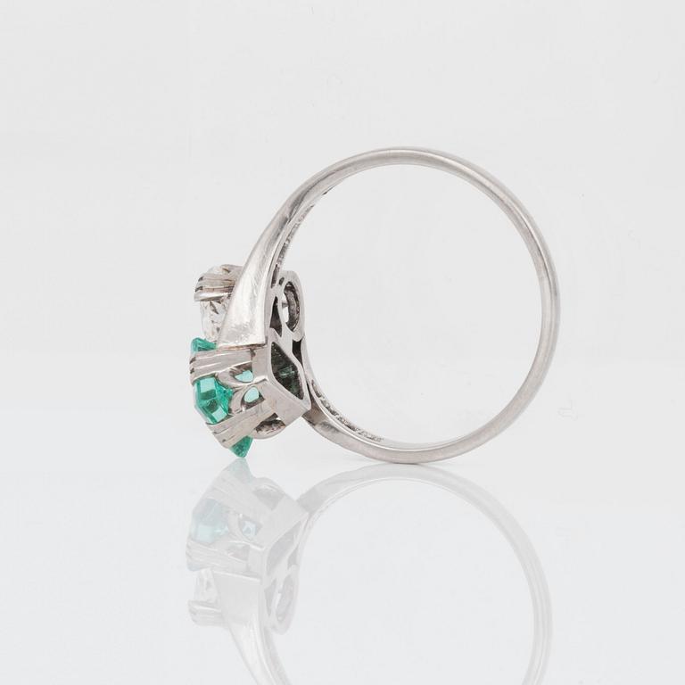 An old-cut diamond, circa 0.90 cts, and tourmaline ring.