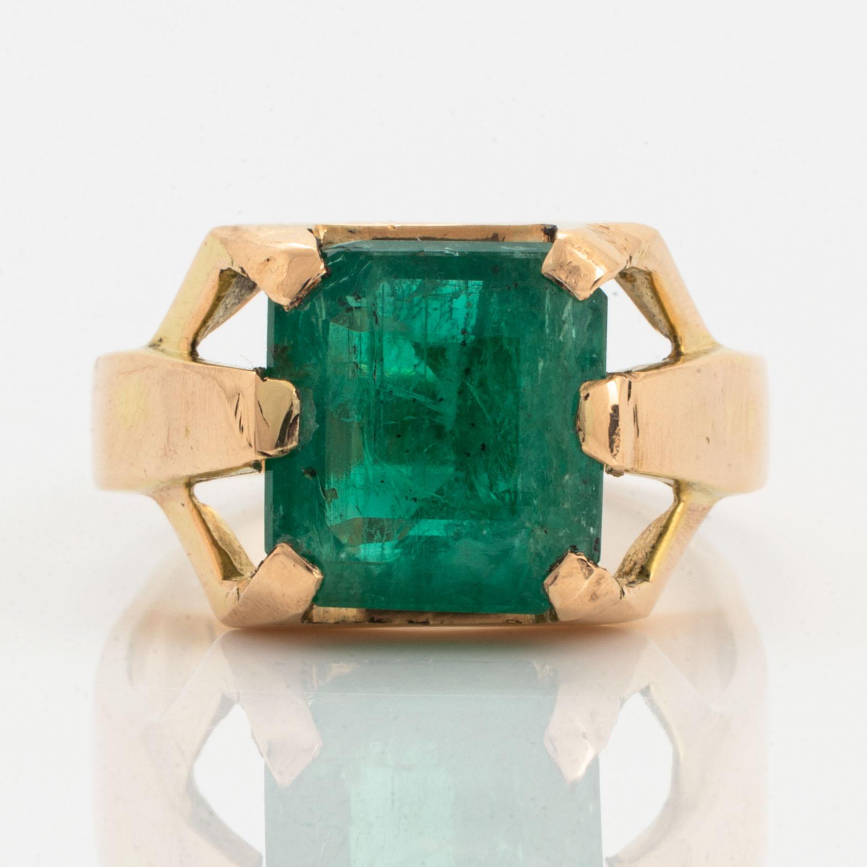 Emerald-cut emerald.