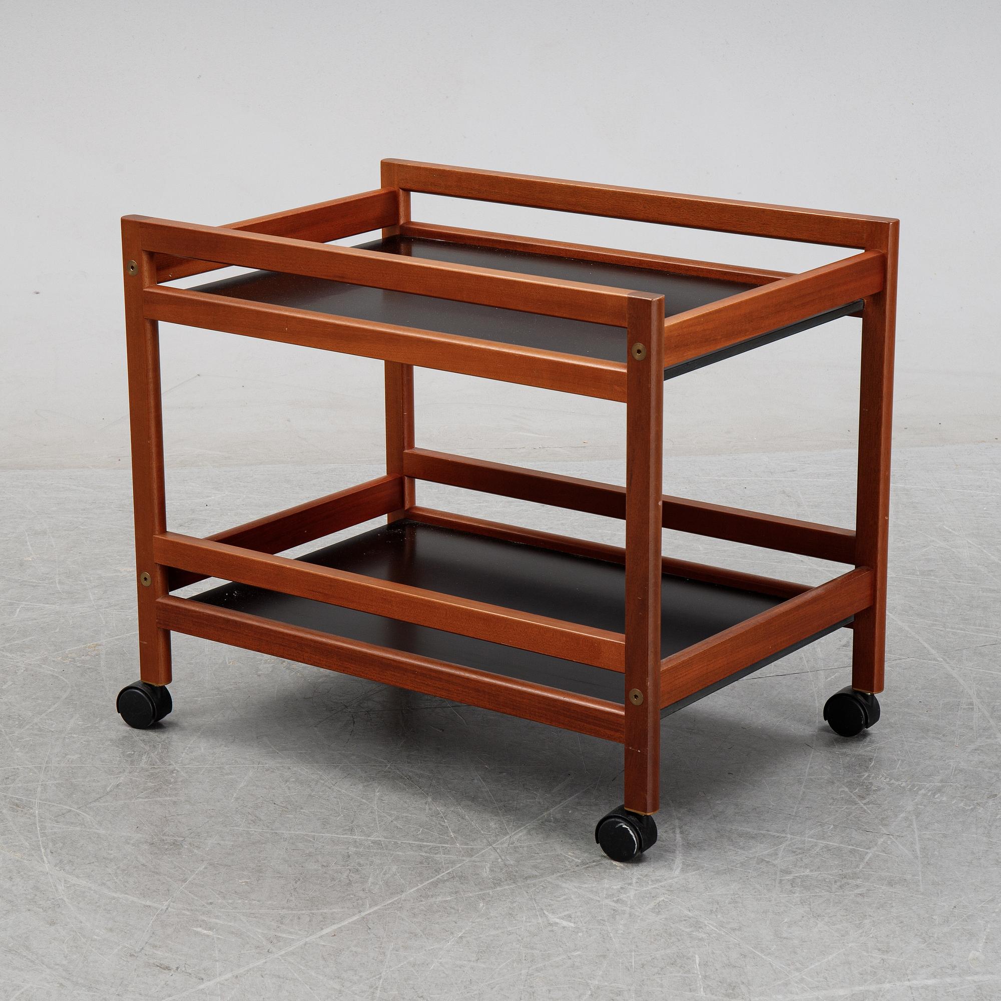 Børge Mogensen, a model '5370' teak and laminate trolley from Frederica Stolefabrik, Denmark.