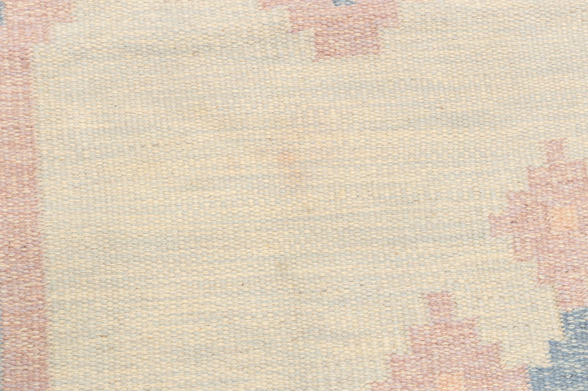 A flat weave carpet, signed GG, ca 236 x 161 cm.