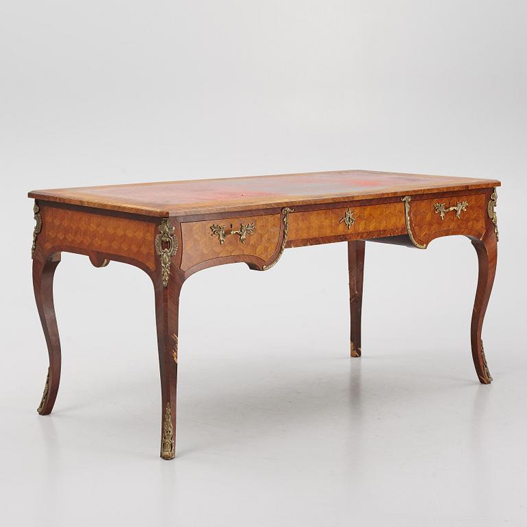 A Louis XV-style bureau plat desk, early 20th century.