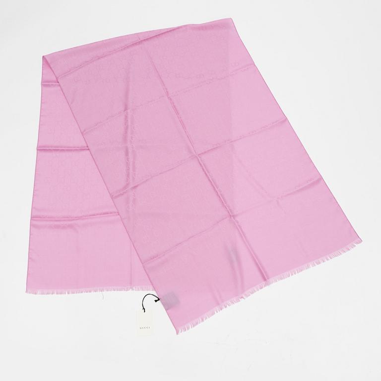 Gucci, a wool and silk mix "GG" jaquard shawl.